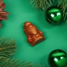 New Year. Figure made of milk chocolate 