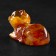Souvenir "cat lies", amber
