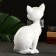Figure "Cat with a bow sits" White, 23x15cm