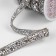 Rhinestones and beads are thermoclayes, width - 10 mm, 4.5 ± 0.5 m, silver color