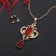 Set 2 objects: earrings, pendant "openwork" Vivaldi, white-red color in gold, 50 cm