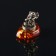 Ganesha souvenir, brass, amber resin, 1.7x1.7x1.1 cm