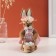 Decor "Zayushka in a pink dress with a basket with testicles" 14x22x10 cm