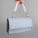 A bag for a bag, plastic, with carbines, 23 × 17 mm, 30 cm, white/silver color