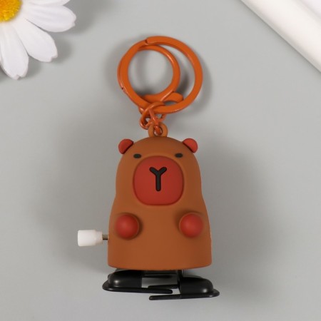 A plastic keychain with a CAPIBARA CARBINA, Walks 5.5x7.5x4.5 cm-1