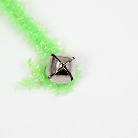 A teaser-pile with a shiny mouse on a wooden handle, green-2