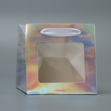 A packet for a cake with a square bottom and window, holographic, 15 x 15 x 15 cm