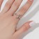 Ring "Cloves with a cross", the color of silver, dimensionless