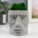 Kashpo concrete "Head" with moss height 8.5 cm gray (moss green stabilized)