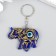 Tail of plastic eyes "Indian elephant from the evil eye" Blue with gold 3.5x5 cm