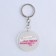 Acrylic keychain with a joke "is difficult to be modest", diam. 4.5 cm