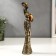 Souvenir Polystone "African with a jug, in an outfit with mirror mosaics" MIX 26x7x5 cm