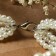 The beads "burn" pearls, ball No. 2.6.8, white color in silver, l = 45 cm