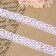 Knitted lace, 25 mm × 10 ± 1 m, white color