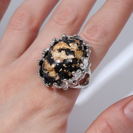 Ring "Izd" oval amber, brown-black color in silver, dimensionless-1