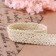 Knitted lace, 20 mm × 10 ± 1 m, beige color