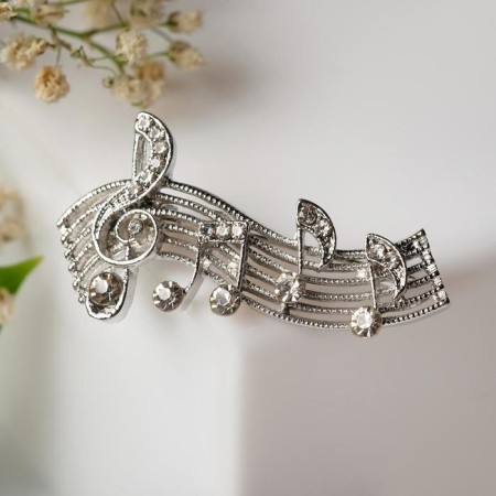 Brooch "Notes" melody, white color in silver