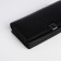 Women's wallet on a magnet, black color