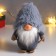 Interior doll "Santa Claus in a gray fur cap, skiing" 21x11x13 cm