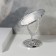 The mirror of the desktop "oval", two -sided, with an increase, a mirror surface 9 × 12 cm, the color is silver