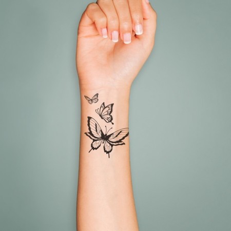 Black "butterfly" tattoo on the body 6x6 cm-2