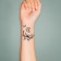 Black "butterfly" tattoo on the body 6x6 cm