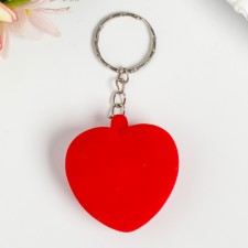 A keychain on the ring velvet squeaks 