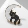 Icon "cat" on the moon, black and white color in gold