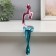 Souvenir Polystone "Man in Headphones" pink-blue 5.9x9.4x23 cm