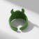 Ring "Montrustrik" with horns and eye, the color is green, dimensionless