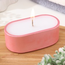 A candle in an oval candlelight made of gypsum, 9.5x4.7x3cm, pink