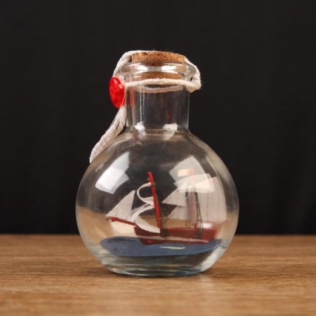 The ship souvenir "Vseslav", in a bottle, vertical. 9*7cm