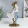 Souvenir Polystone "In love pair - back to the back" The white -blue gradient is 25.5x8.5x13.5 cm