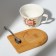 Ceramic mug on a stand with a spoon of “cozy winter”, 230 ml, beige color