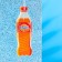 Suspended Grand Caratt flavor soda, orange cardboard