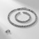 Set 3 objects: earrings, necklaces, bracelet "ice" circle, white color in silver