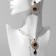 Set 2 objects: earrings, pendant "Eye", blue-white color in gold, 48 cm