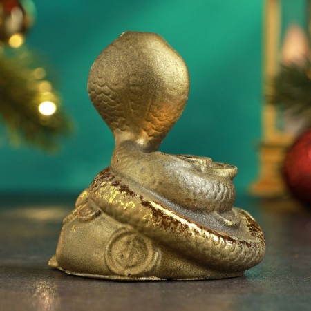 Figure "Snake of a cobra on bags with coins" 10x7x13cm, gold