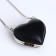 Female bag on a magnet, black color