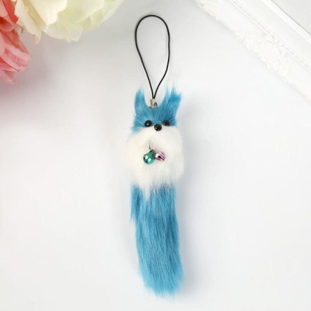 Fluffing on a pendant with colored bells mix