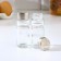 Glass set for spices on a stand, 4 items: a solo, a lists, a napkin, a capacity for toothpicks