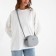 Bag Women's Cross-Bodi with a zipper, gray color