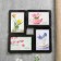 Photo frame plastic in 4 photos 10x15 cm "smooth lines" black 30x30 cm