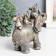 Souvenir Polystone "Elephant and three elephants on the back" Light gold 15x8.5x6 cm