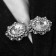 Cardigan clamp "Accent", white color in silver