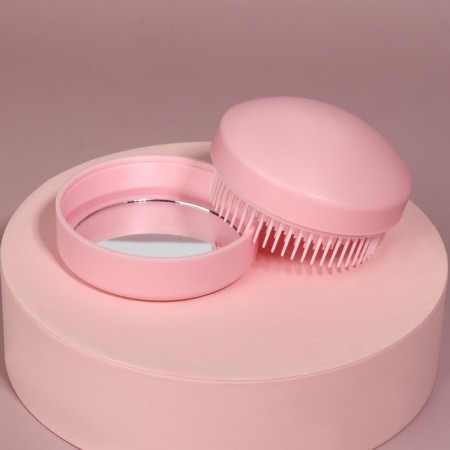 The comb is massage, round, folding, with a mirror, d = 7.5 cm, in the box, the color is pink-2