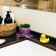 Concrete Kashpo "Osminog" height 7 cm, d-6.5 cm black with a white paw with moss (moss green, stub)