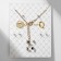 Set of 6 items: 3 pairs fluffs, pendant 2 rings "owl", colored in gold, 45 cm