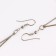 Earrings hanging "rustle" crosses, color mix, 8.5 cm