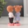 Souvenir Polystone "A couple with a bun and a casket" set 2 pcs 5.5x6.5x11 cm